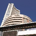 Sensex closes 694 points low