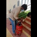 Liquor bottles in a gas cylinder as illegal transport busted in Krishna district