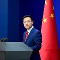 China warns USA do not play against fire