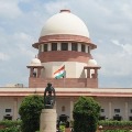 Supreme Court orders AP govt to remove party colours on offices