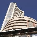 Sensex closes 746 points low