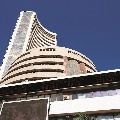 Sensex closes 380 points high