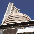 Sensex touches record highs