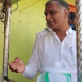 harish drinks tea at a stall