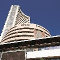 sensex ends 487 points low