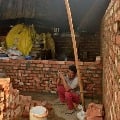 farmers constructing homes