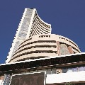 Sensex loses 562 points