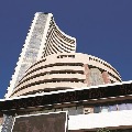 Sensex loses 871 points