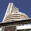 Sensex ends 465 points low