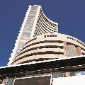 Sensex gains 976 points