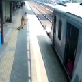  Mumbai Cop Saves Elderly Man from being Crushed Under Train 