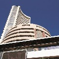 Sensex ends in records high