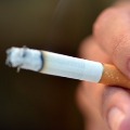 3 friends shared cigarette tests corona positive