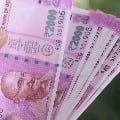 2000 note printing not stopped says Centre