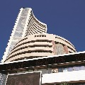 Sensex closes 553 points high