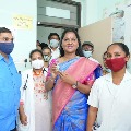 YCP MLA Dr Vundavalli Sridevi gives vaccine for health workers 