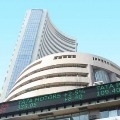 Sensex ends 996 points high