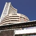 Sensex ends 143 points high