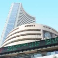 Sensex ends 748 points high