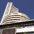 Sensex ends in profits amid volatile trading