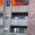 Man catches three year old dropped from burning building 