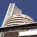 Sensex closes 143 points low