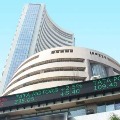 Sensex ends 399 points high