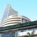 sensex ends 230 points high