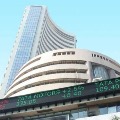 Sensex ends 409 points high