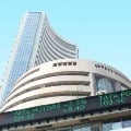 sensex closes 376 points high