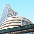 Sensex ends 700 points high