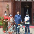 President Ramnath Kovind presents a cycle for a young racer