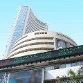 Sensex closes 214 points high