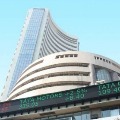 Sensex ends 63 points low 