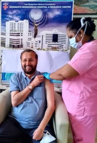 Union Minister Prakash Javdekar receives his first shot of COVID19 vaccine
