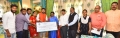 Pochampally Giridhar handed over a cheque to Telangana Governor