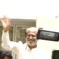 Rajinikanth greets fans gathered outside his residence