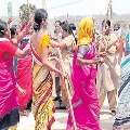 woman relatives attack on police in Nizamabad