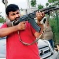 Hyderabad corporators husband holds AK 47 