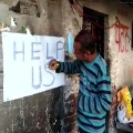 No work due to lockdown painter writes Help Us on wall of house